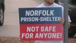 Dozens gather in Norfolk to protest migrant shelter at old corrections facility: ‘It’s not fair’