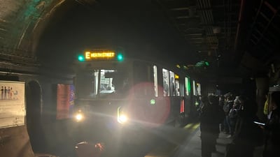‘We’re like miners’: Commuters left stranded in dark MBTA stations after power problem halts trains