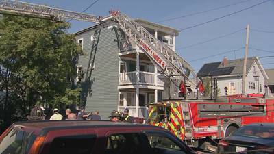 Photos: Fire breaks out at triple-decker home in Everett