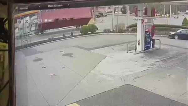 WATCH: Van collides into Stoughton gas station after tractor trailer rollover