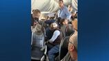Massachusetts native films moment passengers tackled man on American Airlines flight