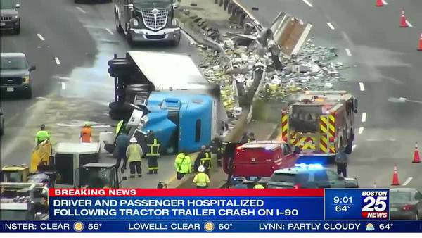 2 people injured after tractor-trailer overturned on Mass Pike in Boston
