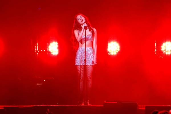 Olivia Rodrigo falls through hole in stage during concert