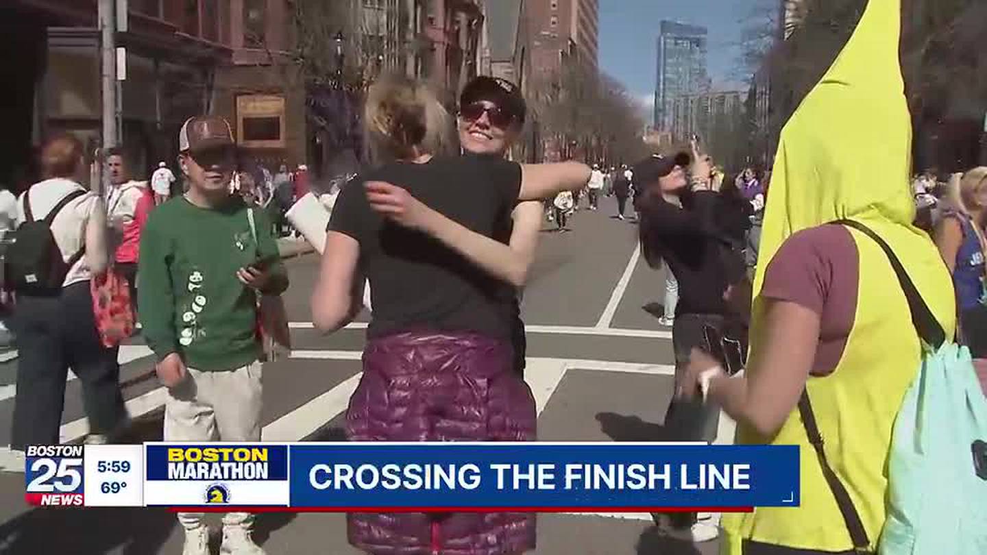 Thousands of marathon runners ready to celebrate after crossing finish line