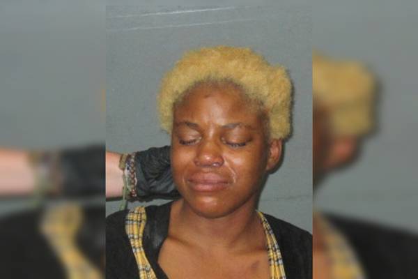 Louisiana woman charged with attempted murder after lying in street with baby, police say