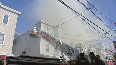 Photos: Smoke consumes Chelsea neighborhood as firefighters battle blaze