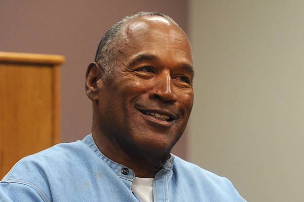 O.J. Simpson Heisman Trophy, other possessions to be auctioned to pay off debt