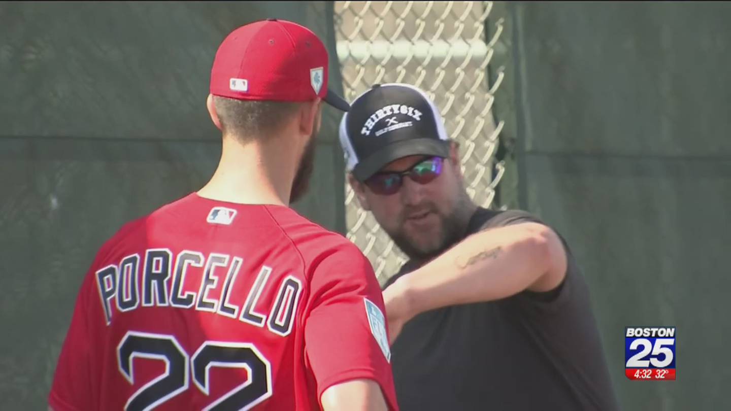 SI Photo Blog — Pedro Martinez hugs winning pitcher Derek Lowe