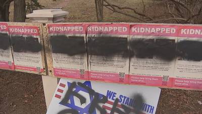 Newton homeowners hoping to fight hate with humanity after display of Israeli hostages defaced