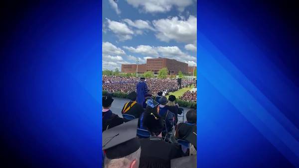 Diplomas & dollar bills: UMass Boston grads surprised with $1,000 each during commencement ceremony