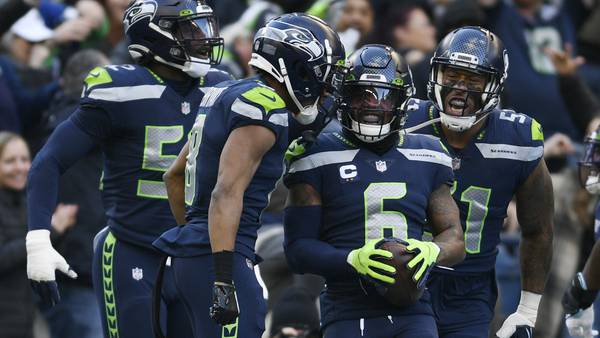 Exuberant Seahawks player came off the sideline during INT, started throwing blocks
