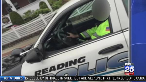 Police investigating photo that appears to show officer texting while driving