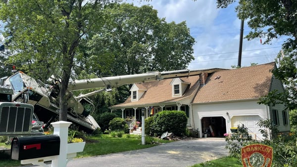 ‘By the grace of God’: Crane crashes into Franklin home after sinking into old septic tank 