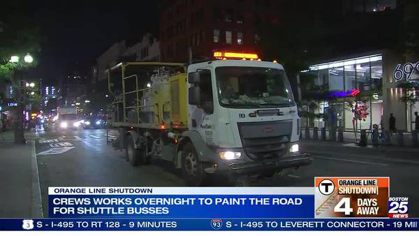 Crews paint roads for shuttle buses as Orange Line shutdown draws near