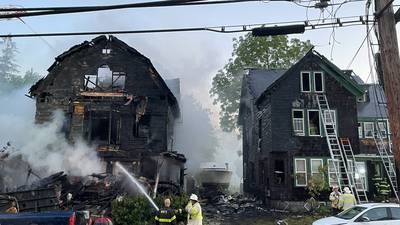Photos: Fire seriously damages two homes in Brockton