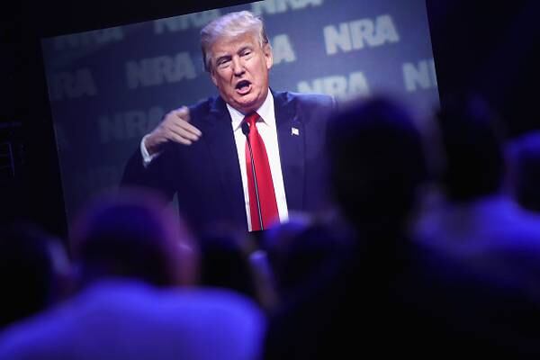 Guns are banned during Trump’s speech at NRA conference; some speakers withdrawing