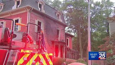 Firefighters battle three-alarm fire at Roxbury home