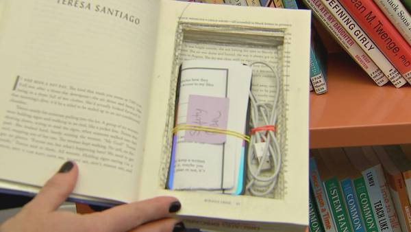 Local librarian hides cell phones in books to help domestic violence victims