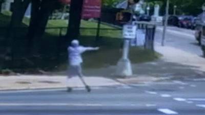 New surveillance video shows gunman open fire in the middle of a busy Boston intersection 