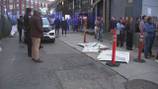 Large sign tumbles down, strikes person walking on Lansdowne Street