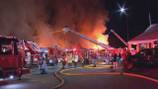 Raging blaze burns through multiple businesses on the North Shore