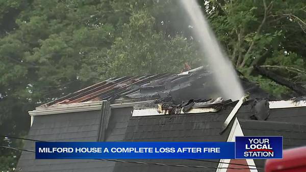 Woman able to escape fire that destroys Milford home