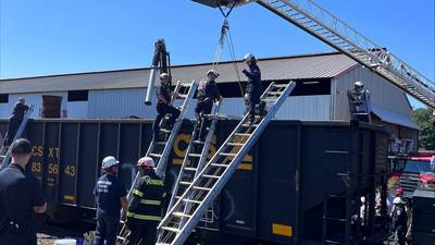 Worker rescued after being trapped in train car full of coal in Bridgewater