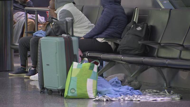 Migrant families sleeping at Boston’s Logan Airport as emergency ...