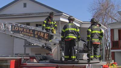 Photos: Woman, firefighter hospitalized after raging blaze tears through Lowell home