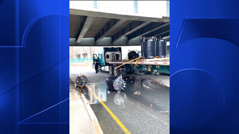 Crews cleaning up Storrow Drive after tall truck strikes Longfellow ...