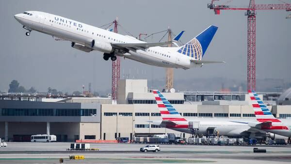 U.S. Attorney: Mass. man tried to open emergency door, stab attendant on flight from LA to Boston