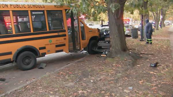 1 hospitalized after Boston school bus with students onboard collides with sedan, other parked cars 