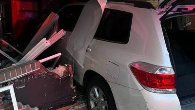 Malden car collides with building 