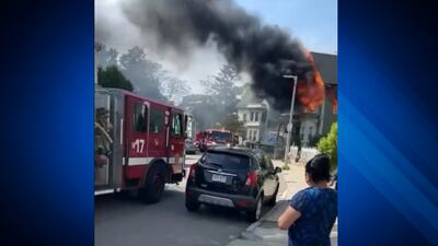 2 taken to hospital, 9 displaced after fire tears through Dorchester home