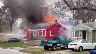 Crews battle heavy blaze at Onset home