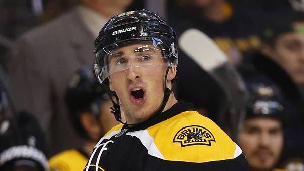 Marchand has 2 goals and an assist in return, Bruins roll