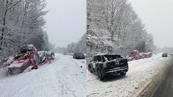 Vehicle rolls off car carrier, falls on snowy highway as storm causes slew of crashes in New England