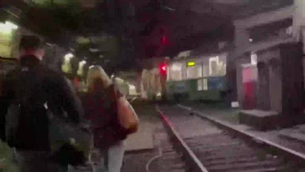 Video shows commuters hiking along tracks after Green Line trains evacuated in tunnel