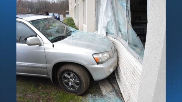 Driver charged after crashing vehicle into Massachusetts hotel being used as migrant shelter