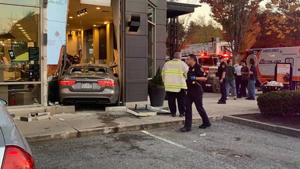 Car crashes in Wellesley Starbucks