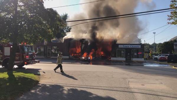 Auto body shop in Wayland destroyed, roaring fire detonates cars inside 