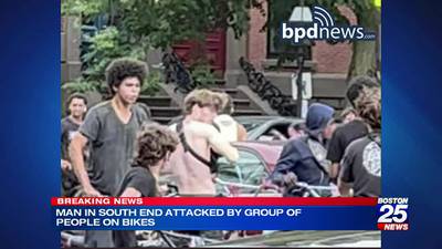 Man left bloodied after dozens of bicyclists surround his car in the South End