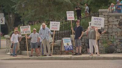 Norfolk residents protest hours after first migrant families arrive