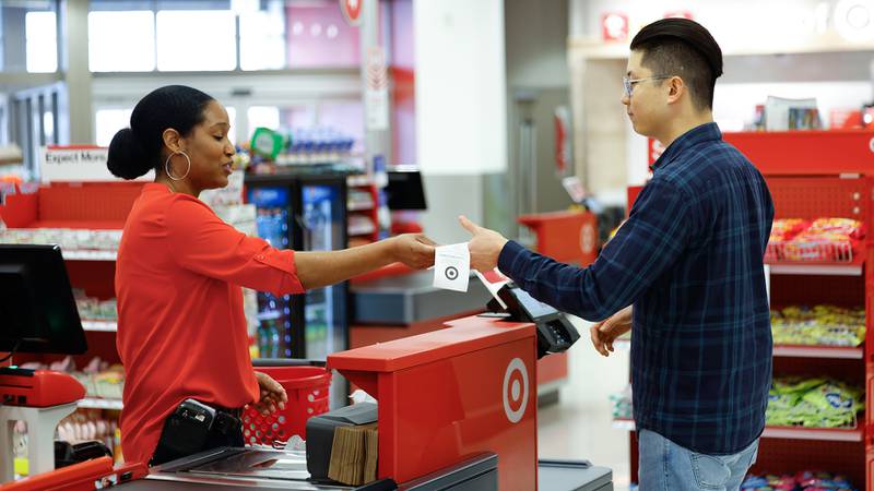 Team members are seen helping guests during the Target Communications Creative on February 23, 2024 in Chicago, Illinois.