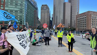 Photos: Extinction Rebellion Group protests climate change through Boston 