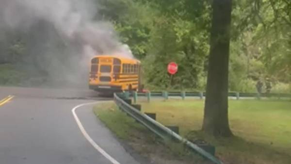 WATCH: Smoke and fire pours from front of school bus in Hyde Park