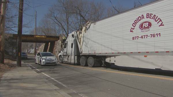 ‘This is a common occurrence’: Truck strikes bridge in Dedham