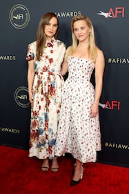 LOS ANGELES, CALIFORNIA - JANUARY 12: (L-R) Natalie Portman and Reese Witherspoon attend the AFI Awards Luncheon at Four Seasons Hotel Los Angeles at Beverly Hills on January 12, 2024 in Los Angeles, California. (Photo by Monica Schipper/Getty Images)