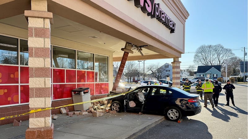 2 people taken to hospital after car crashes into CVS on North Shore
