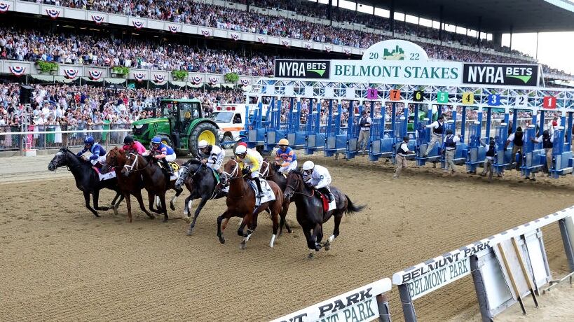 ELMONT, NEW YORK - JUNE 11: The field starts the 154th running of the Belmont Stakes at Belmont Park on June 11, 2022 in Elmont, New York. (Photo by Al Bello/Getty Images)